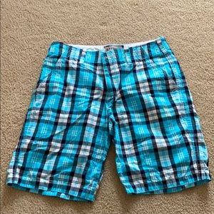 Express, plaid blue, white, and black shorts